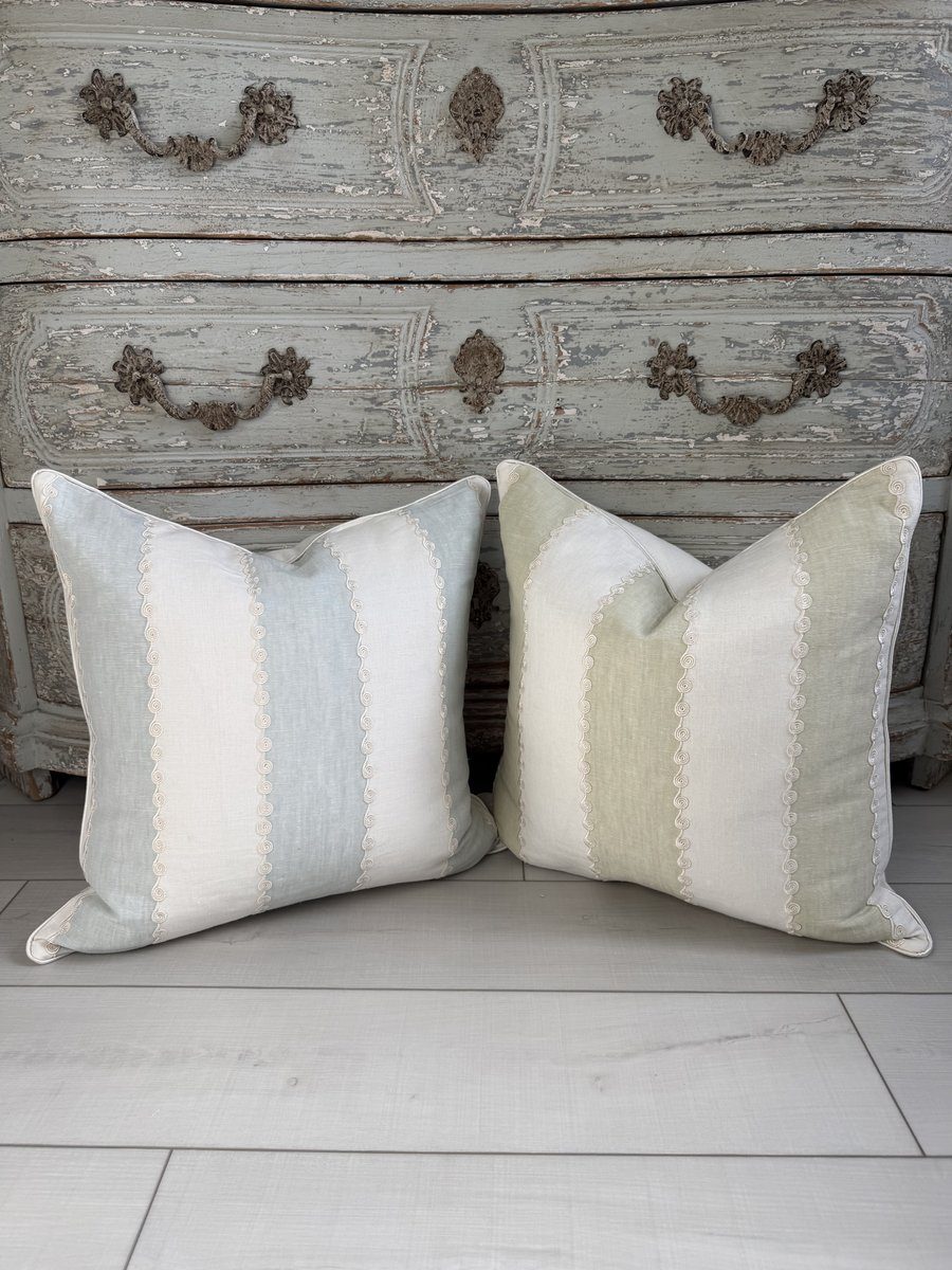 Ashmore GP and J Baker pillows in soft blue and soft green linen stripe against distressed console