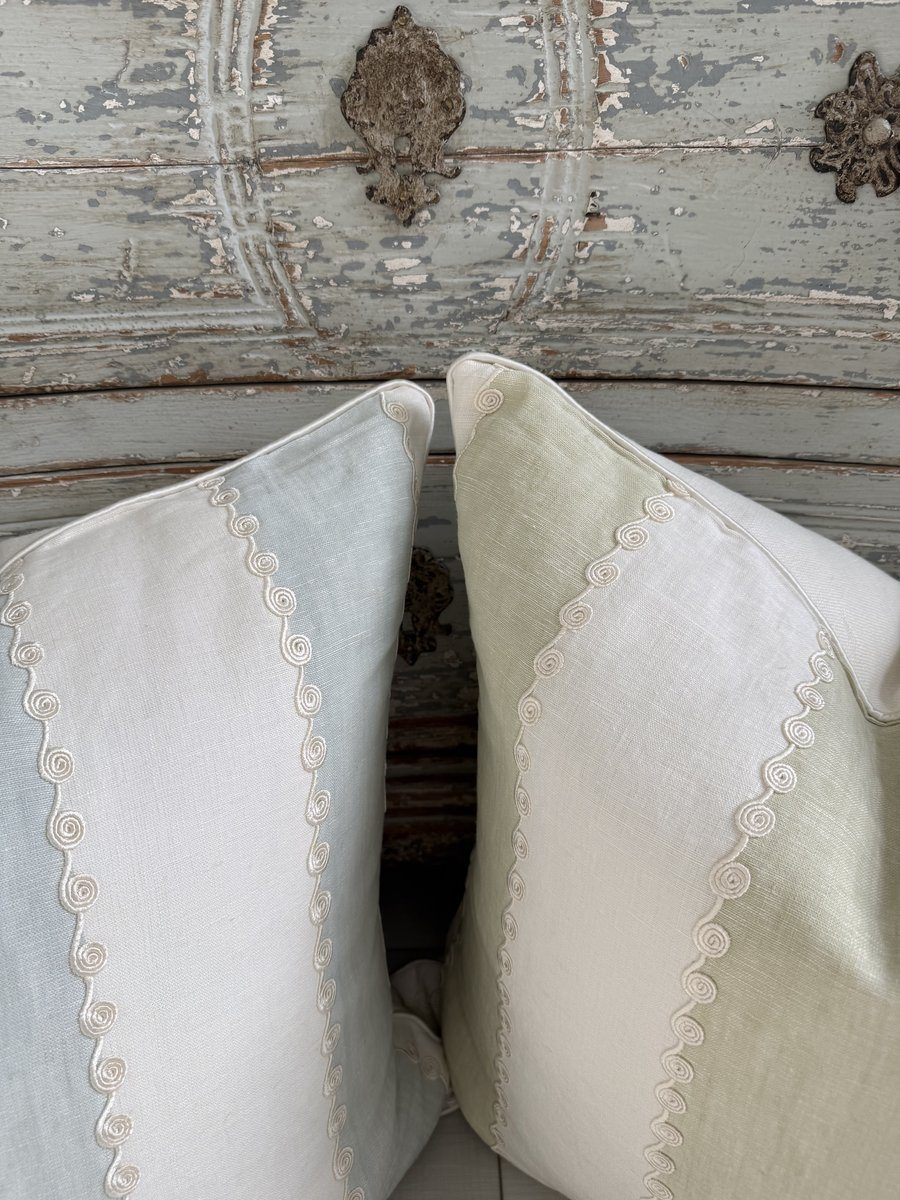 Ashmore pillow pair embroidered ivory scroll detail close-up in soft blue and soft green