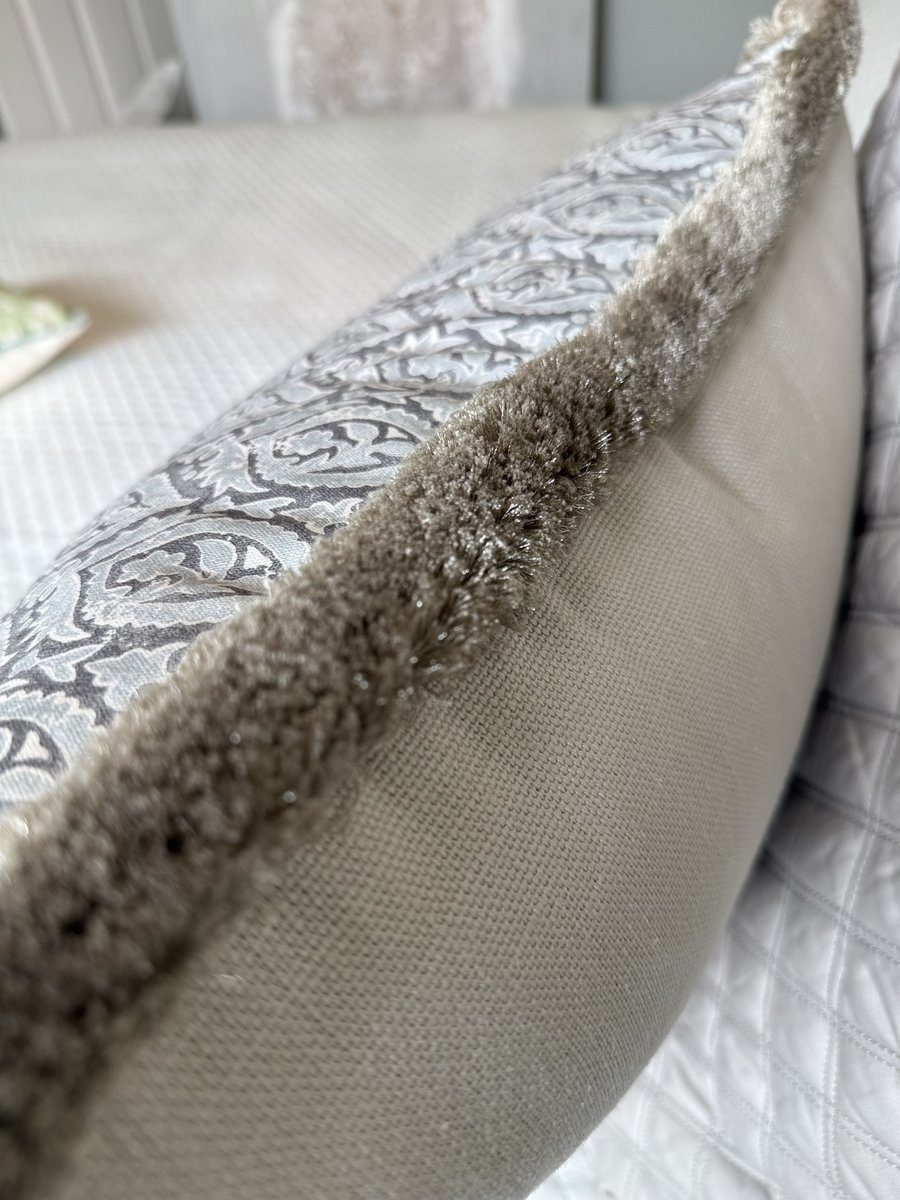Broadway pillow fringe edge detail on taupe linen backing