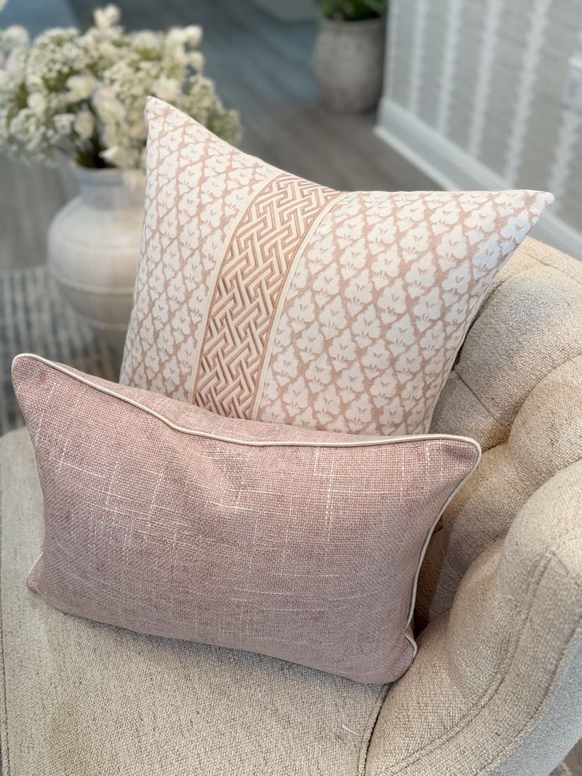 Jennifer blush pillow styled on chair with pink lumbar