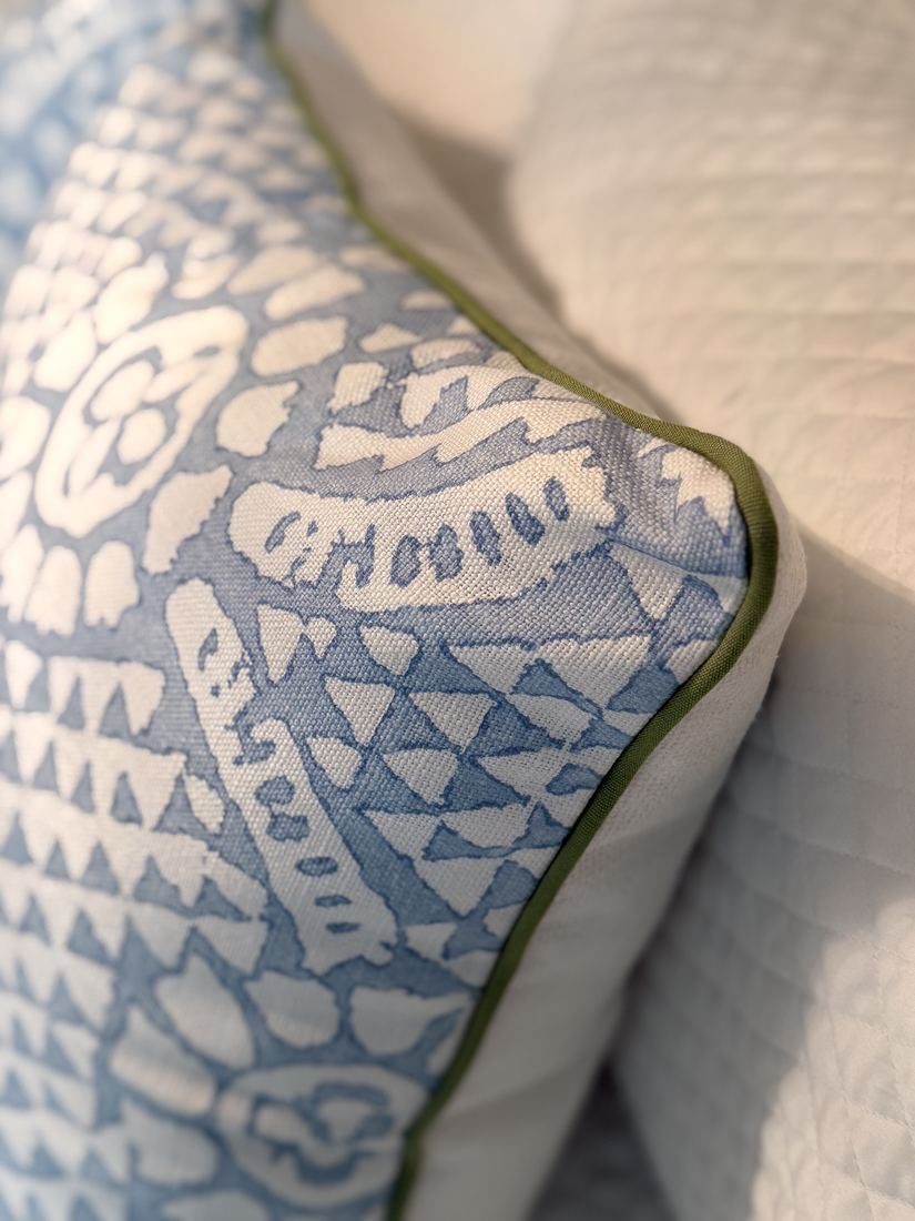 Chamomile spa blue pillow green piping detail