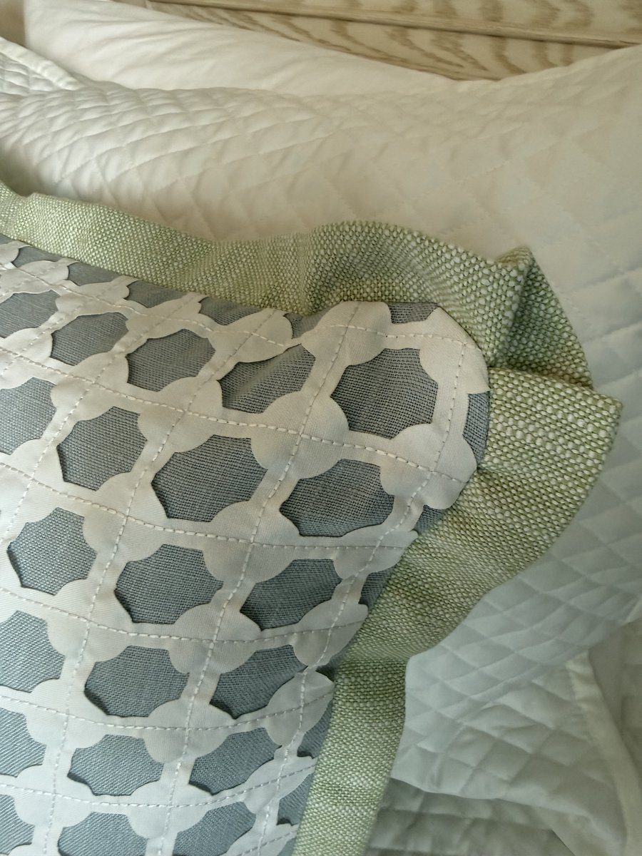 Cothay pillow sage flange corner detail on quilted bedding