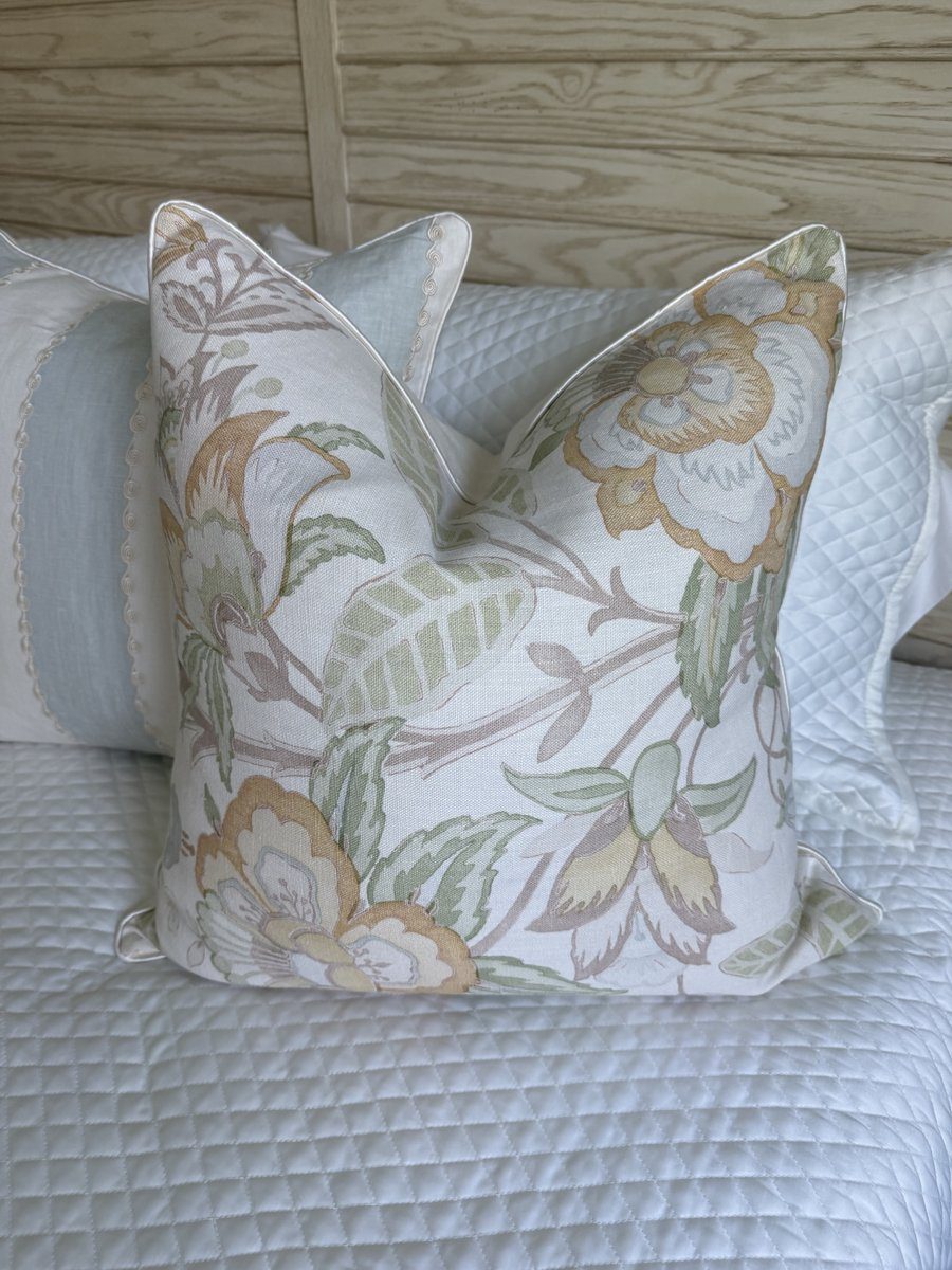 Davenport Lee Jofa floral pillow front view on quilted bedding