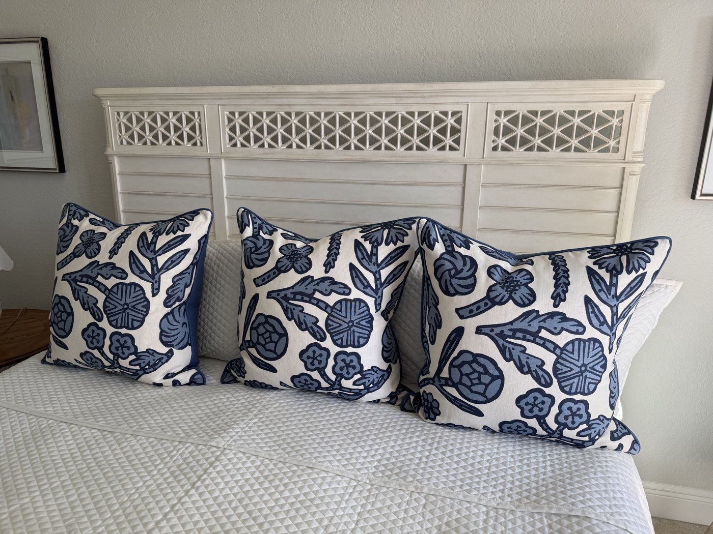Three Day Floral ink pillows styled on bed