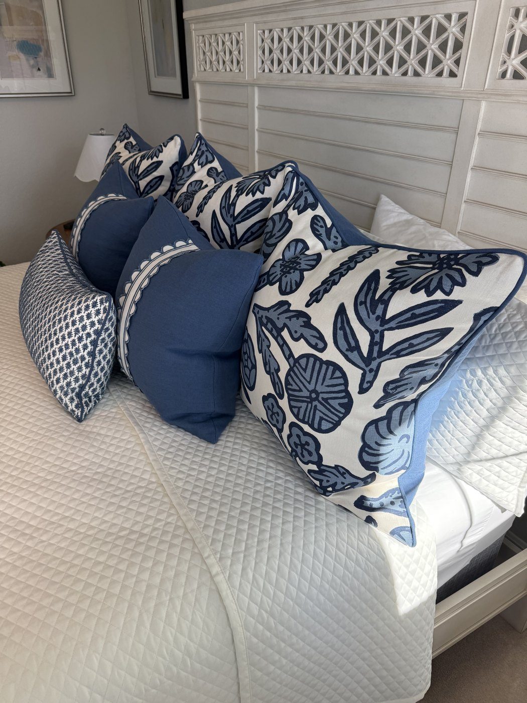 Day Floral ink pillows styled with coordinating navy pillows