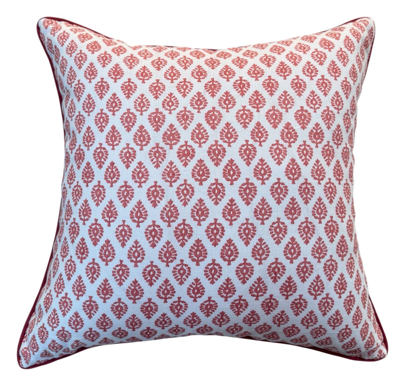 Devi coral red block print pillow with red trim by PepperTree Designs