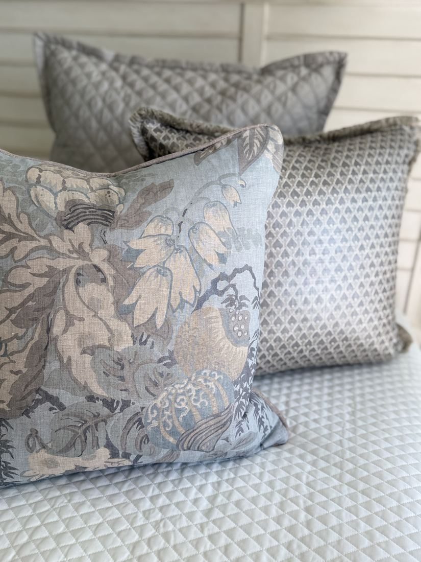Fairbanks floral pillow styled on bed