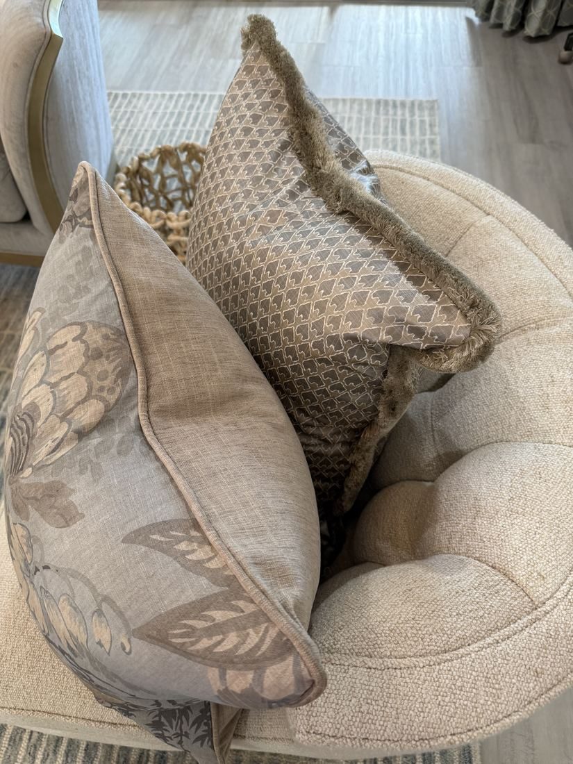 Fairbanks floral and lattice pillows on chair