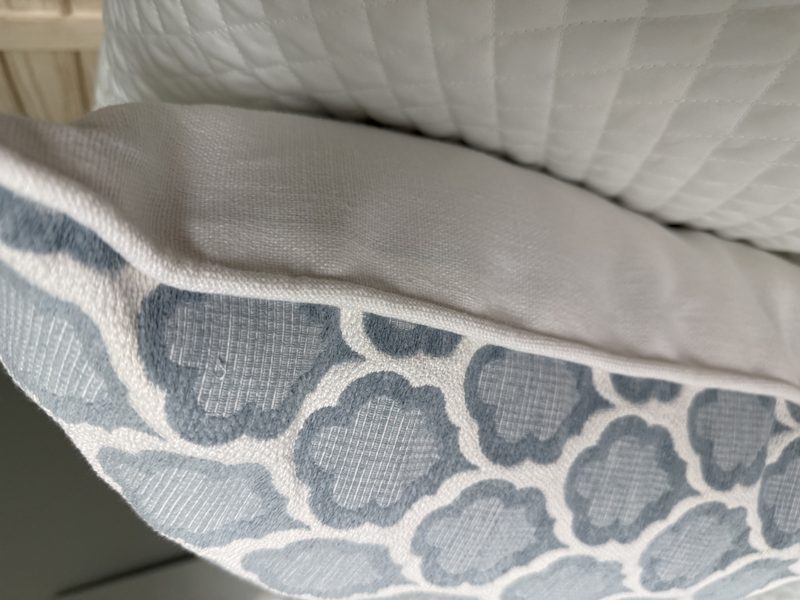 Genie pillow white piping and backing close-up