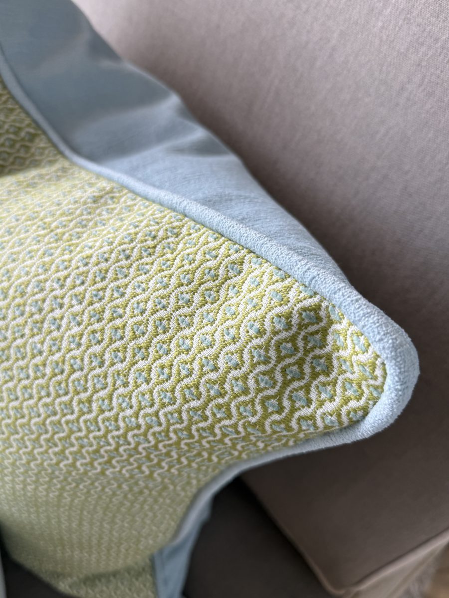 Gertrude pillow soft blue piping and woven fabric corner detail