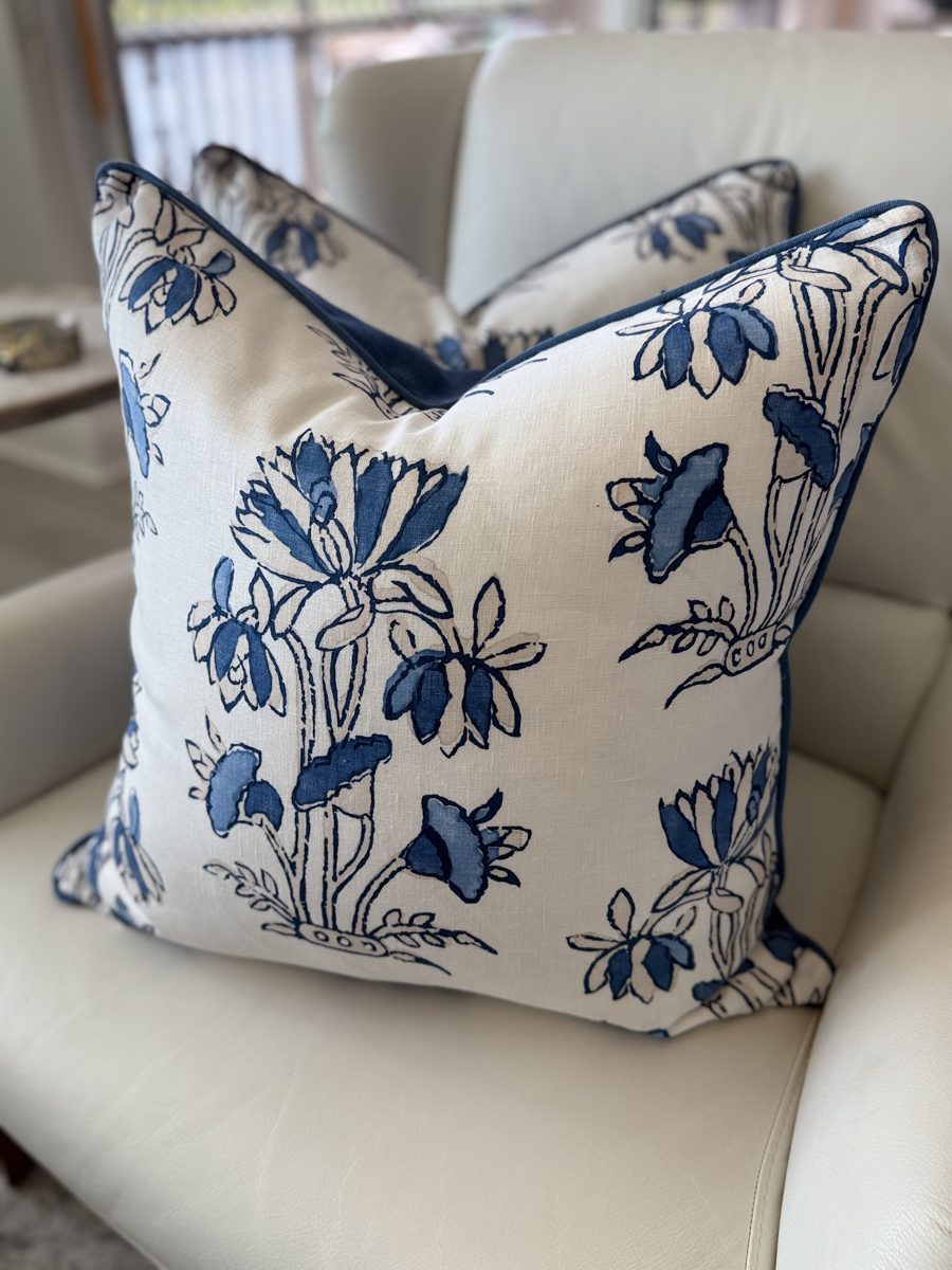 Heidi navy and white block print floral pillow styled on armchair