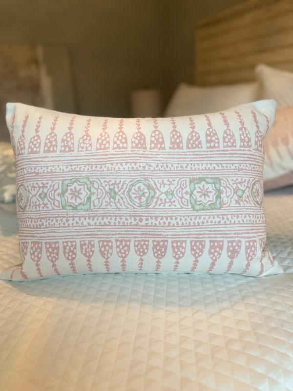 Javanese Stripe blush pillow front view on bed