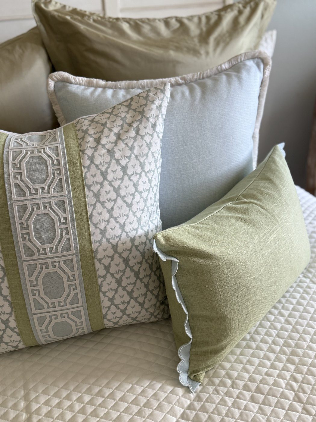 Arboreta Spa Blue pillow with spa blue fringe pillow and green lumbar