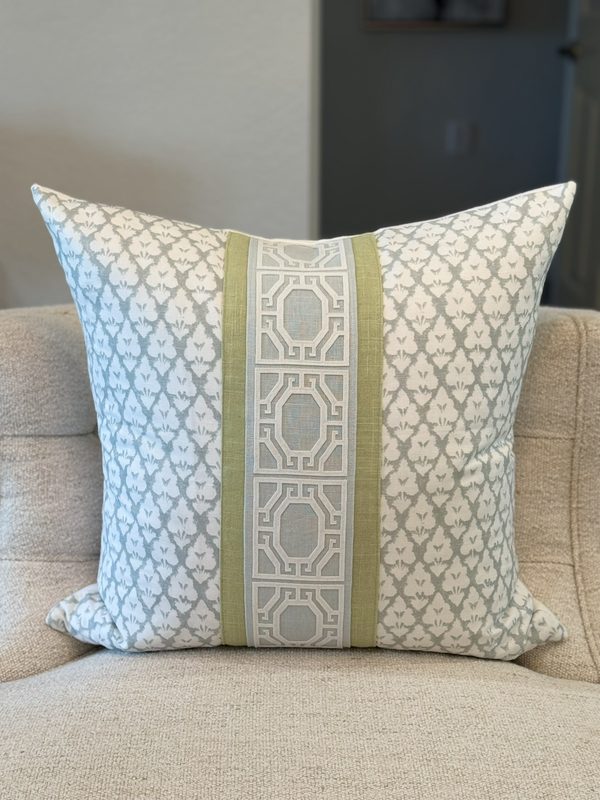 Jennifer spa blue Arboreta pillow with green and blue trim on armchair