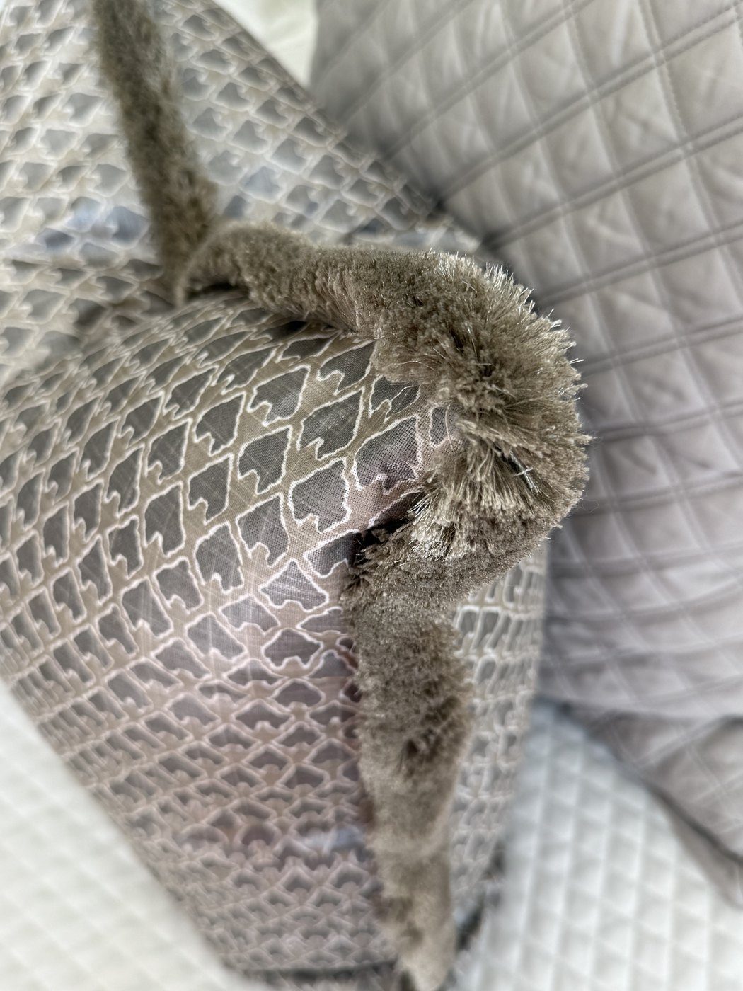 Kanapaali pewter pillow oyster brush fringe corner detail