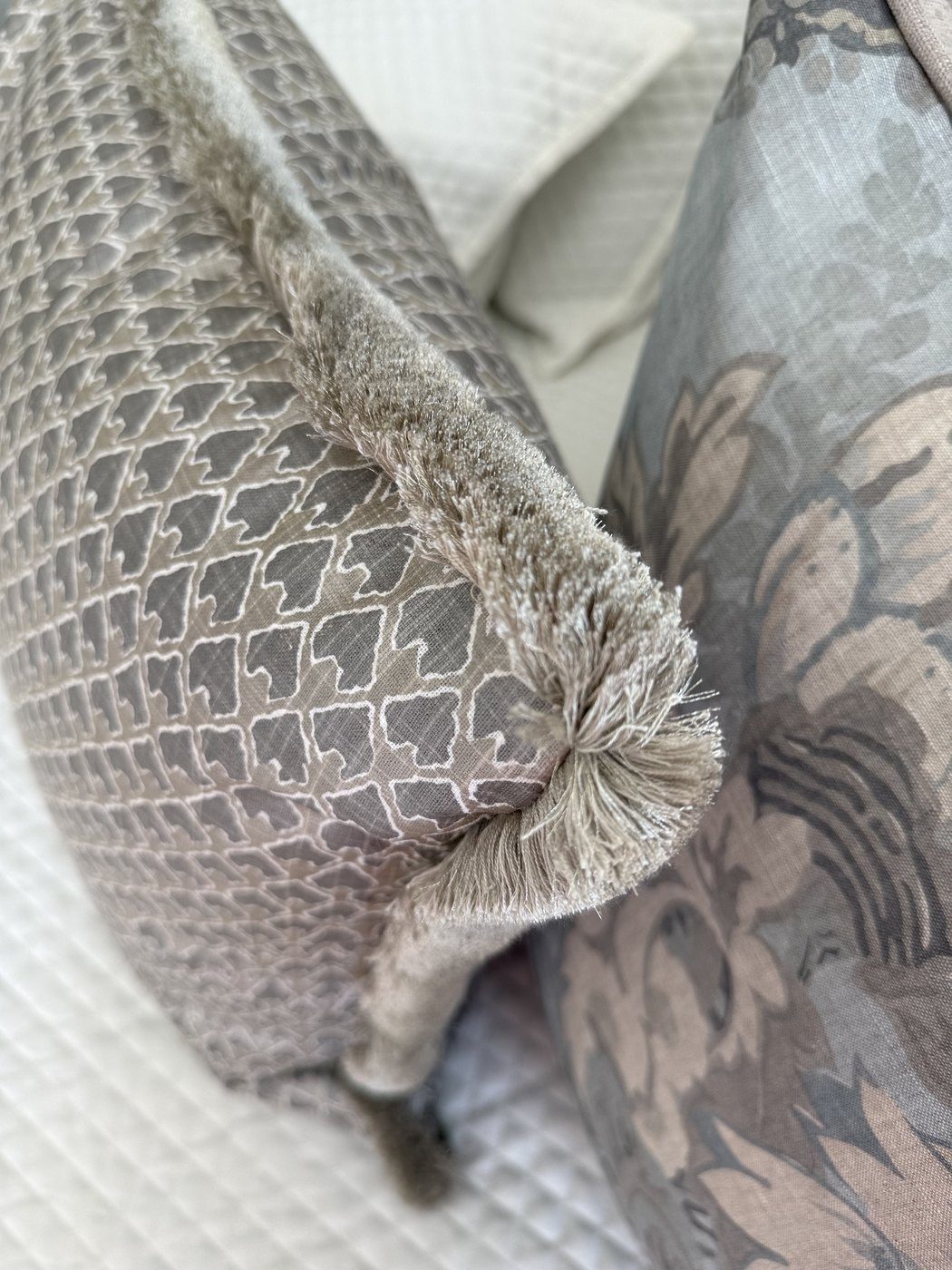 Kanapaali pillow brush fringe detail with floral companion pillow