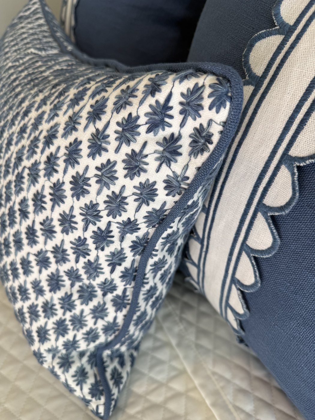 Kristin lumbar with navy scallop pillow detail
