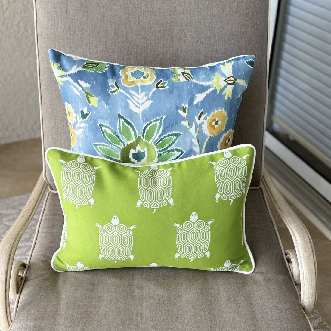 Lilia indoor outdoor pillow with turtle lumbar on chair