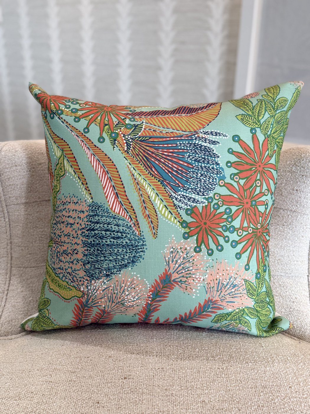 Protea indoor outdoor pillow in seafoam with coral botanical print by PepperTree Designs