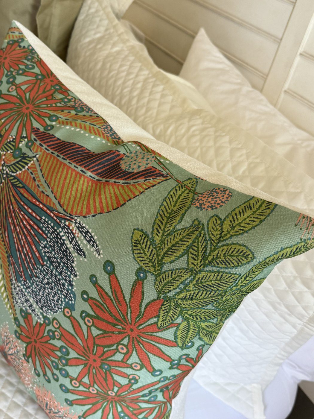 Protea pillow botanical print detail in coral, teal, and green