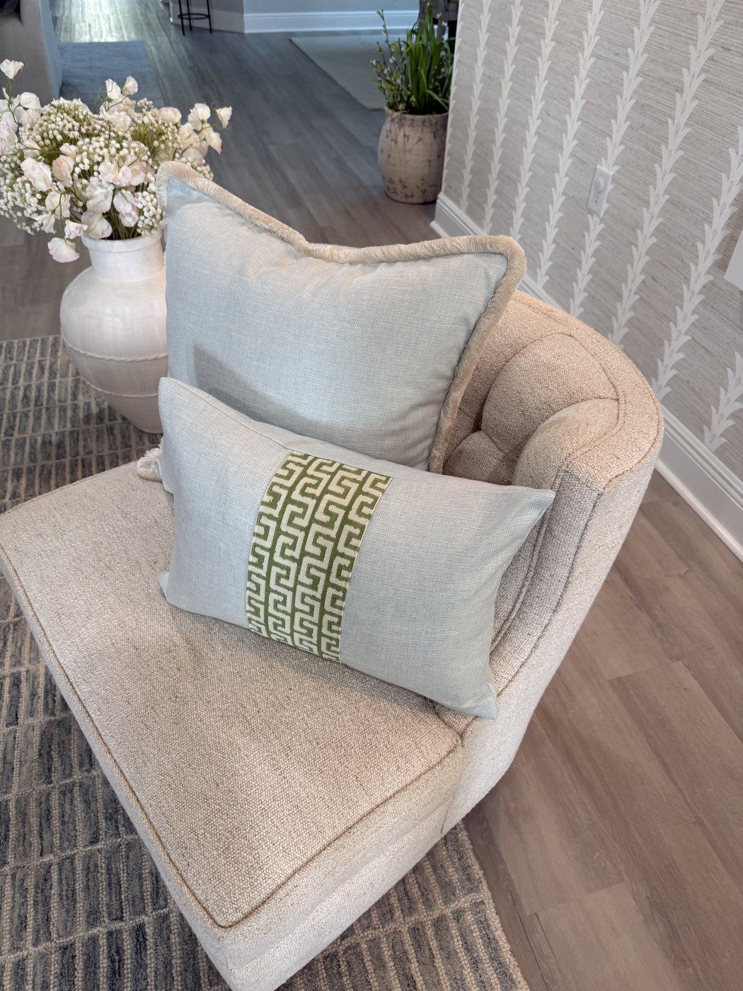 Simply Blue pillow with green Greek key lumbar on armchair