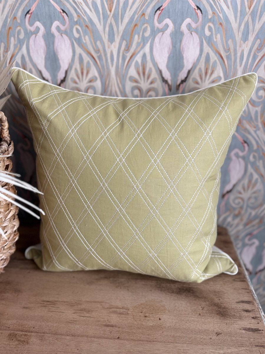 Theodora styled with heron wallpaper