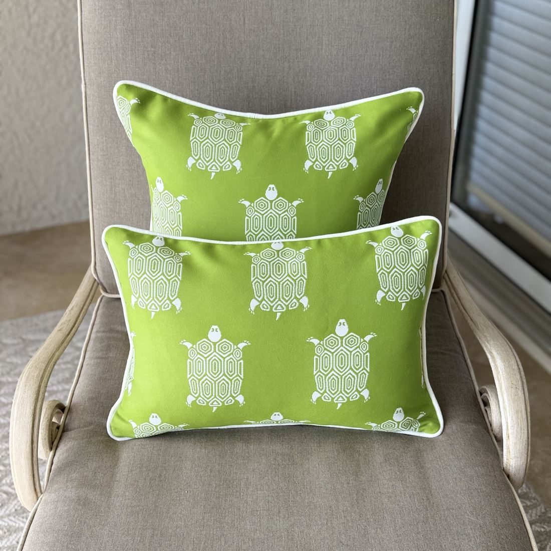 Turtle Bay kiwi turtle pillows square and lumbar on chair