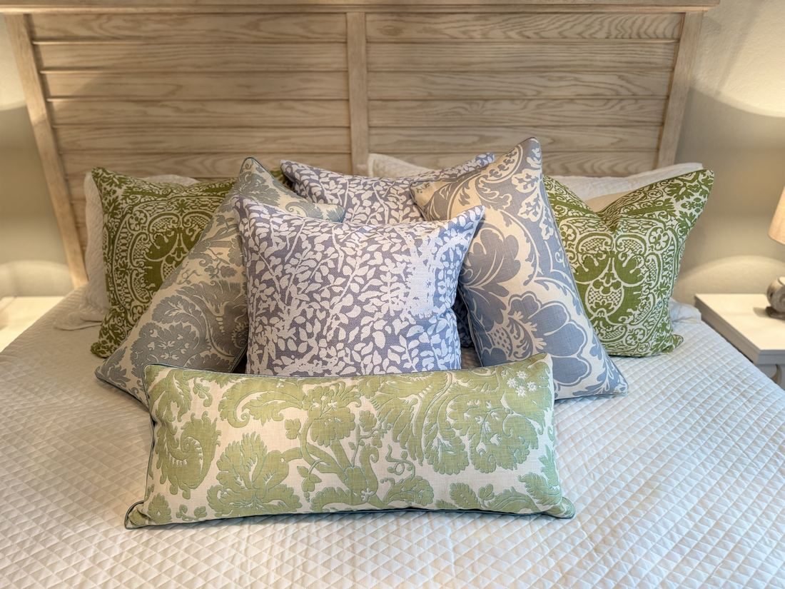 Veneto green pillows on bed with lumbar