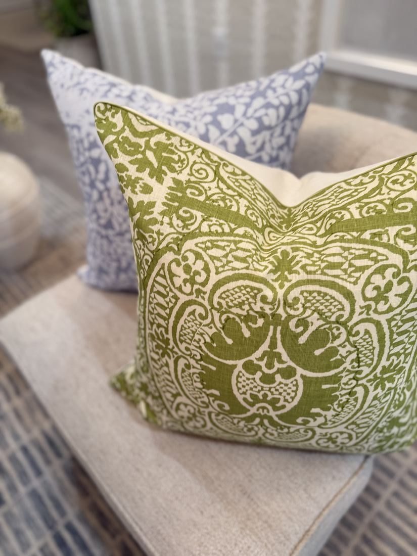 Veneto green pillow styled with blue pillow